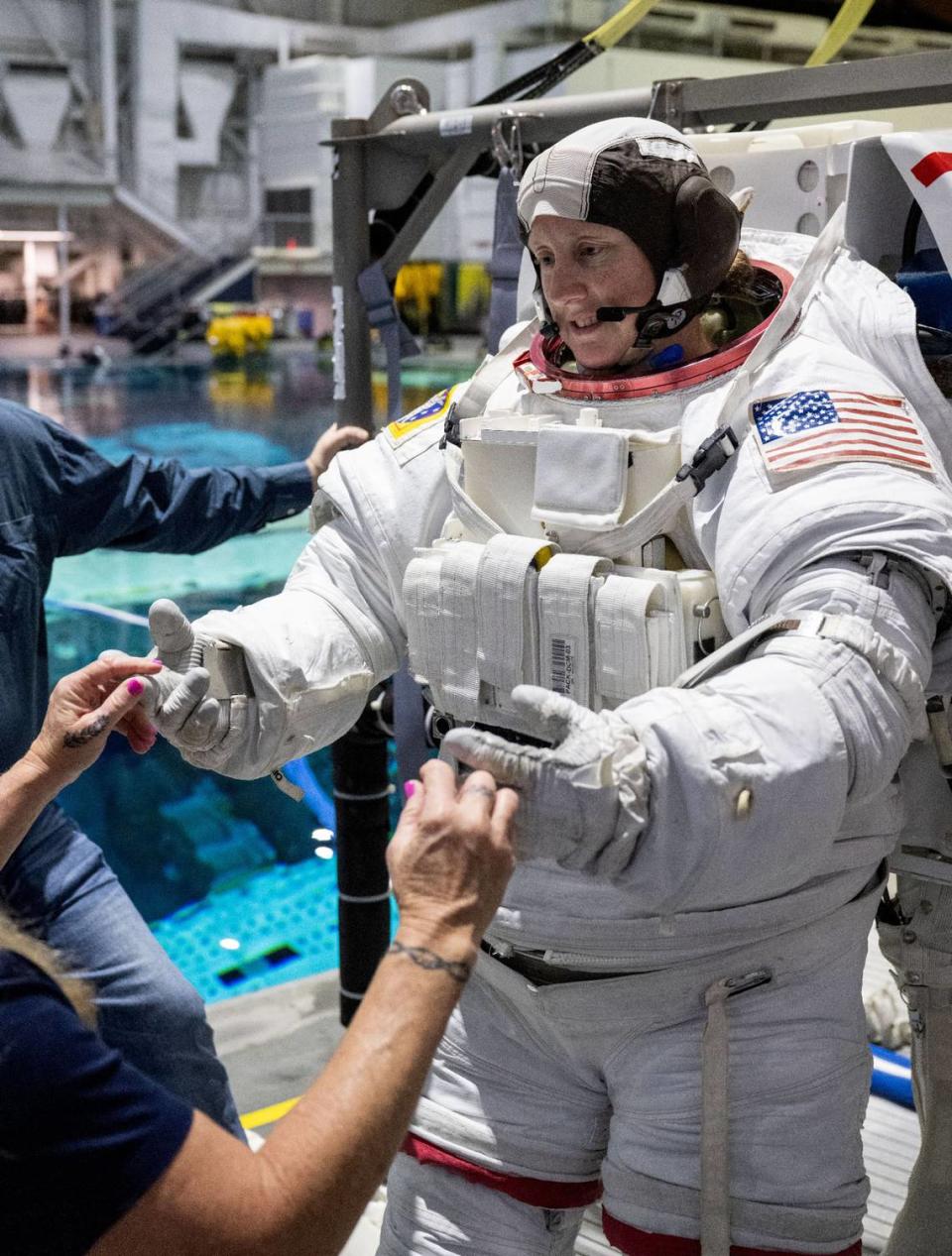 Jessica Wittner is seen in a NASA space suit during training in this undated photo from the space agency. James Blair/NASA