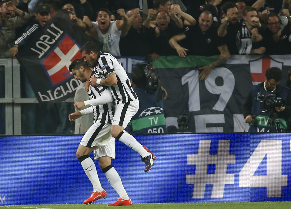 Juventus' Alvaro Morata (L) celebrates scoring their first goal Reuters / Sergio Perez