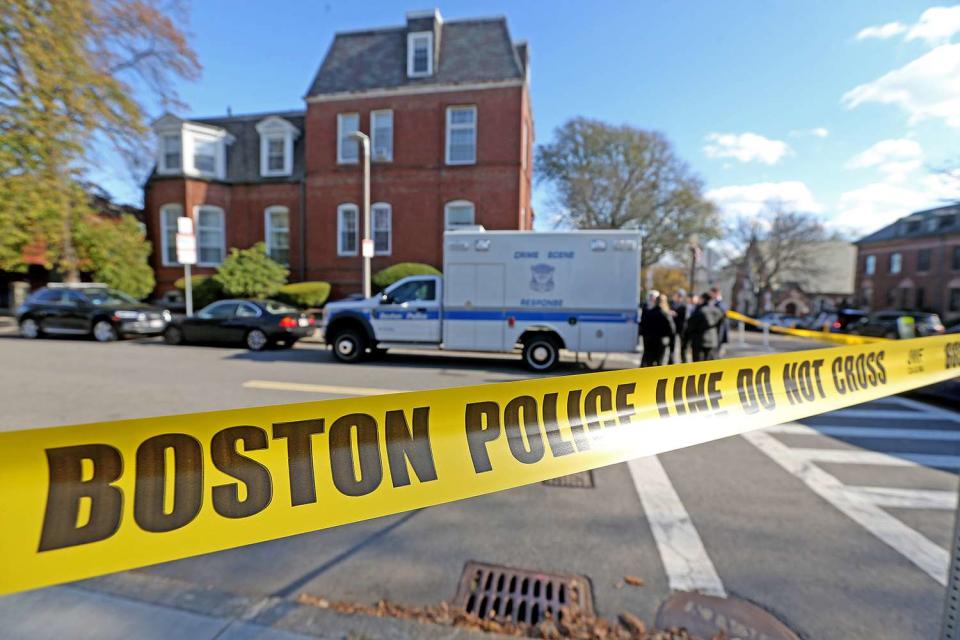 <p>Matt Stone/MediaNews Group/Boston Herald via Getty Images</p> Boston police investigating the scene in November 2022.