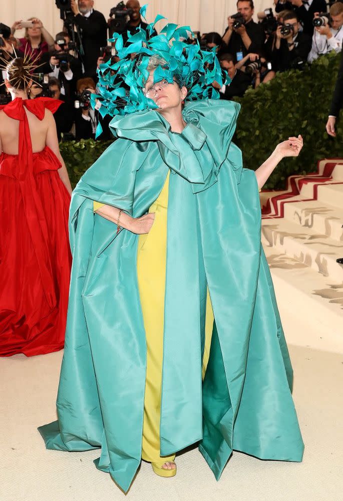 Frances McDormand in a turquoise Valentino cape and headpiece