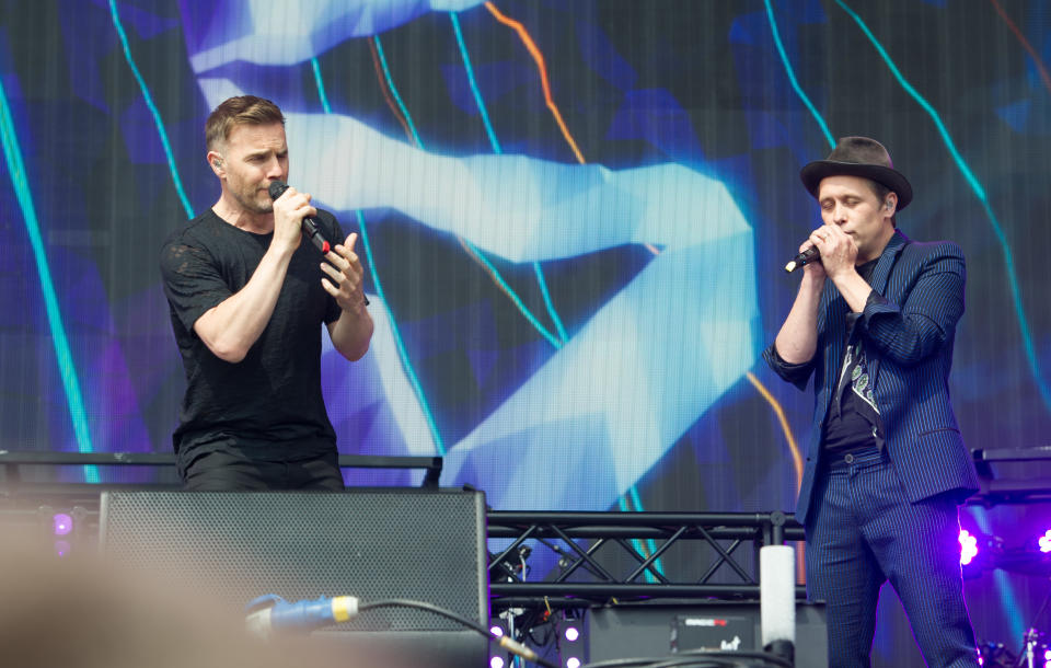 Gary Barlow, Jason Orange and Mark Owen of Take That join Sigma as guests performing live on stage on day 1 at BBC Big Weekend on 28 May 2016 at Powderham Castle, Exeter, UK