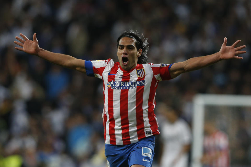 17.05.2013. Madrid, Spain. Copa del Rey final. Real Madrid versus Atletico Madrid. Final score was (1-2) Atl&#xe9;tico broke their Real Madrid drought to claim Copa at Santiago Bernabeu stadium. The picture shows Radamel Falcao Garcia (Colombian striker of At. Madrid) as he celebrates laying on the equalising goal for Diego Costa (Photo by Enrique de la Fuente/ActionPlus/Corbis via Getty Images)