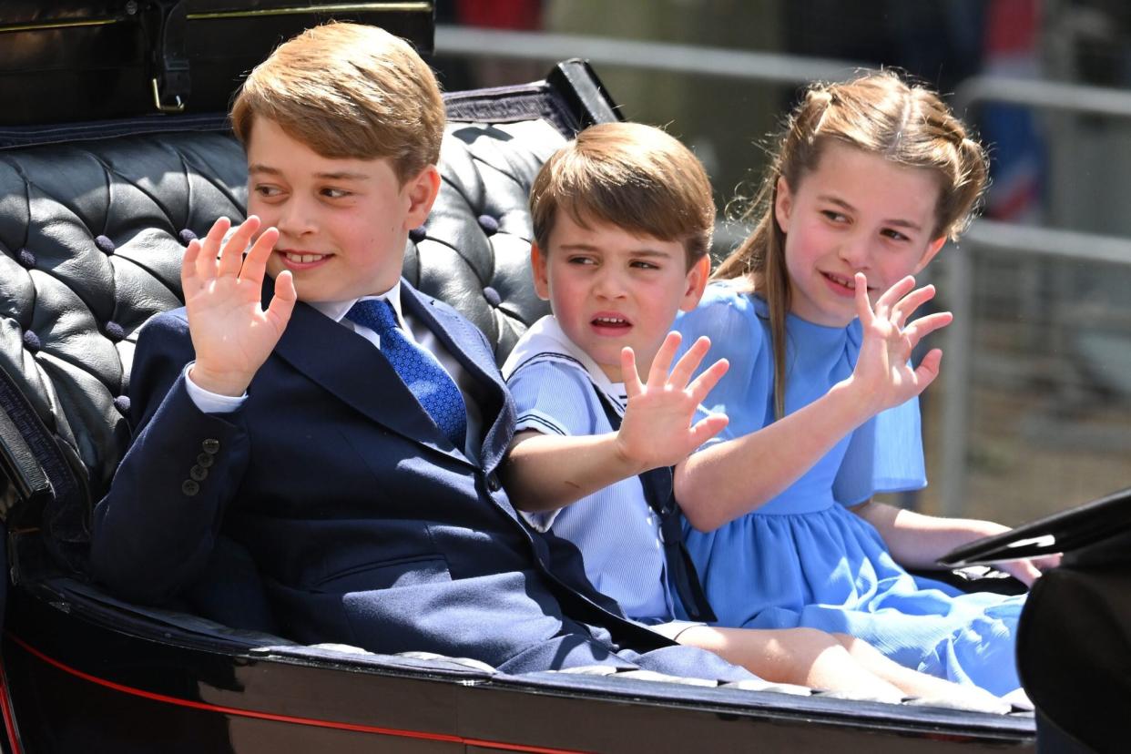 LONDON, ENGLAND - JUNE 02: Prince George, Prince Louis and Princess Charlotte in the carriage procession at Trooping the Colour during Queen Elizabeth II Platinum Jubilee on June 02, 2022 in London, England. The Platinum Jubilee of Elizabeth II is being celebrated from June 2 to June 5, 2022, in the UK and Commonwealth to mark the 70th anniversary of the accession of Queen Elizabeth II on 6 February 1952. Trooping The Colour, also known as The Queen's Birthday Parade, is a military ceremony performed by regiments of the British Army that has taken place since the mid-17th century. It marks the official birthday of the British Sovereign. This year, from June 2 to June 5, 2022, there is the added celebration of the Platinum Jubilee of Elizabeth II in the UK and Commonwealth to mark the 70th anniversary of her accession to the throne on 6 February 1952. (Photo by Karwai Tang/WireImage)