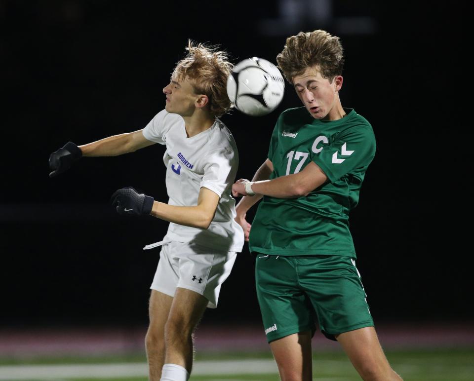 Cornwall's Alexander Schaal and Goshen's Zac Schaller go up for a header during the Section 9 Class AA championship on October 30, 2023.