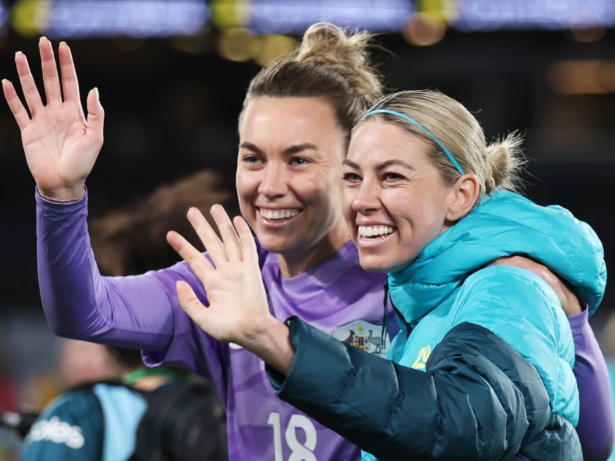 Australian soccer players Mackenzie Arnold and Alanna Kennedy mock