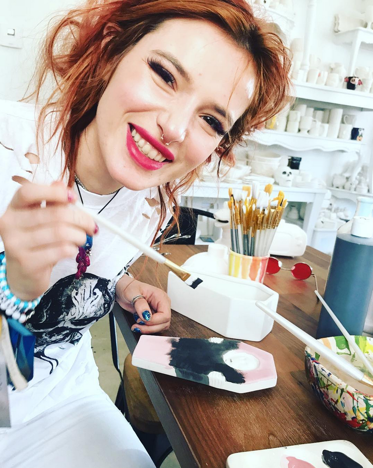<p>In a change of pace from her more racy instagrams, the actress channeled her creativity into some art. “Take me painting and I’m happy as a clam,” she wrote. (Photo: <a rel="nofollow noopener" href="https://www.instagram.com/p/BaHi88wFZmV/?taken-by=bellathorne" target="_blank" data-ylk="slk:Bella Thorne via Instagram;elm:context_link;itc:0;sec:content-canvas" class="link ">Bella Thorne via Instagram</a>) </p>