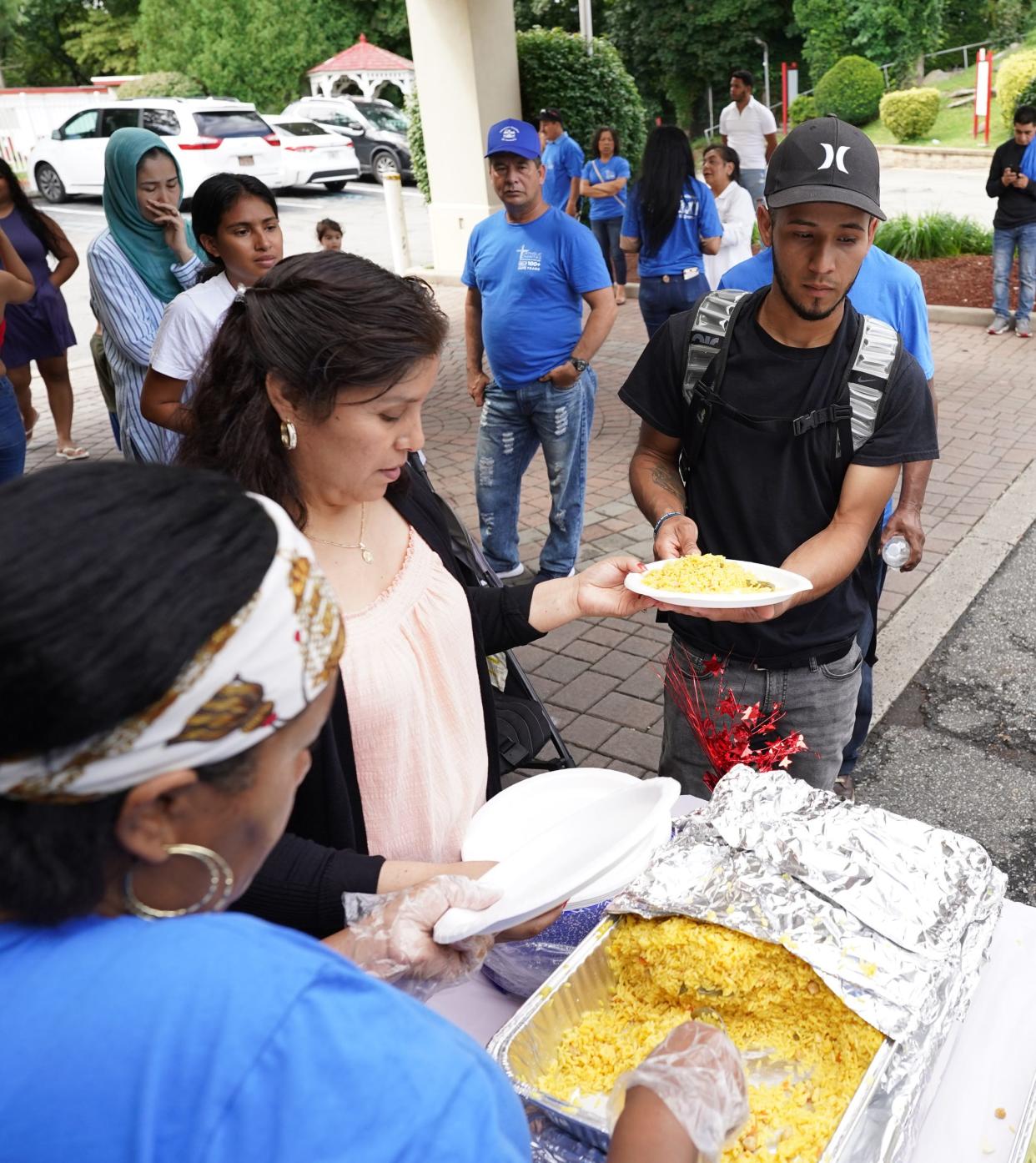 Catholic Charities and Obreros Unidos de Yonkers hosted a lunch for immigrants at the Ramada Inn in Yonkers on Saturday, August 26, 2023.