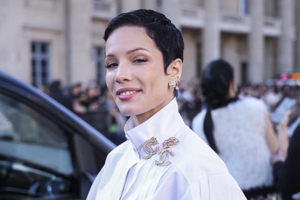 Halsey departs the Chanel ready-to-wear Spring/Summer 2023 fashion collection presented Tuesday, Oct. 4, 2022 in Paris. (Photo by Vianney Le Caer/Invision/AP)