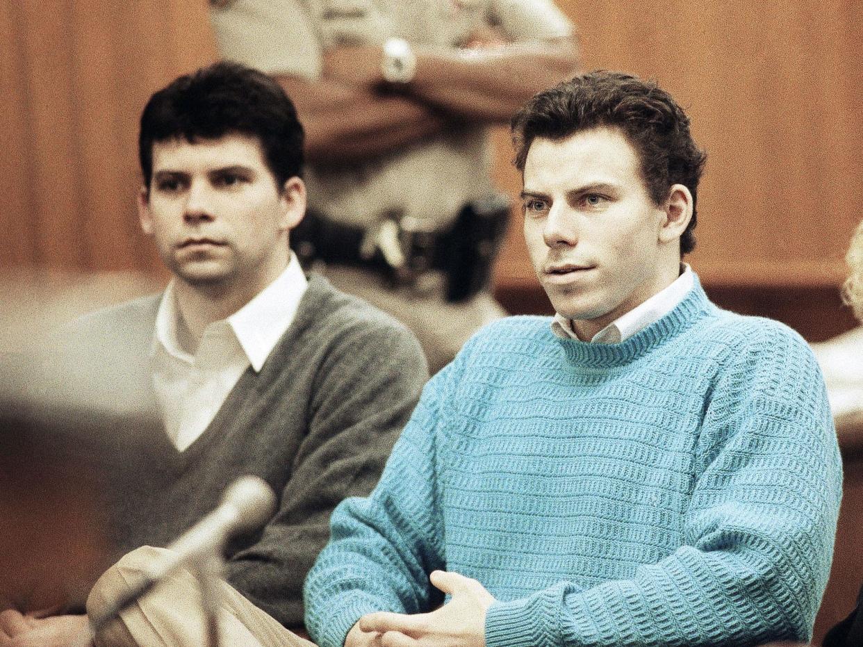 Joseph Lyle Menendez, left, and his brother, Erik, sit in a court room in Beverly Hills, Calif. , Dec. 14, 1990. Scheduling of a preliminary hearing for the brothers accused of killing their parents was delayed again because of a pending appellate court decision on the admissibility of key evidence. (AP Photo/Nick Ut)