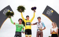 Cycling - The 104th Tour de France cycling race - The 103-km Stage 21 from Montgeron to Paris Champs-Elysees, France - July 23, 2017 - Cannondale-Drapac rider Rigoberto Uran of Columbia, Team Sky rider and yellow jersey Chris Froome of Britain and AG2R-La Mondiale rider Romain Bardet of France on the podium. REUTERS/Benoit Tessier