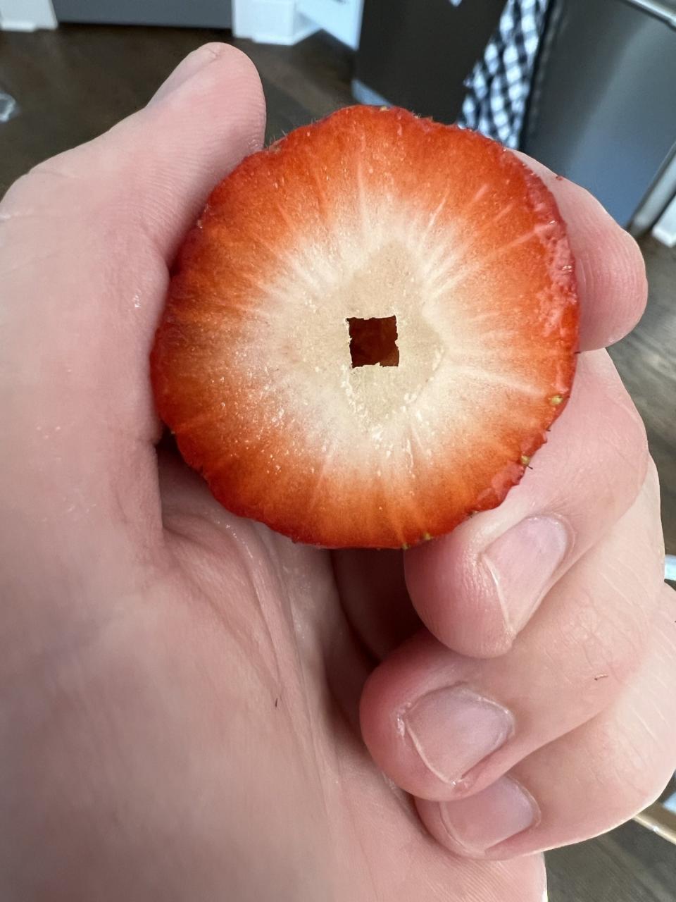 A square hole in a strawberry