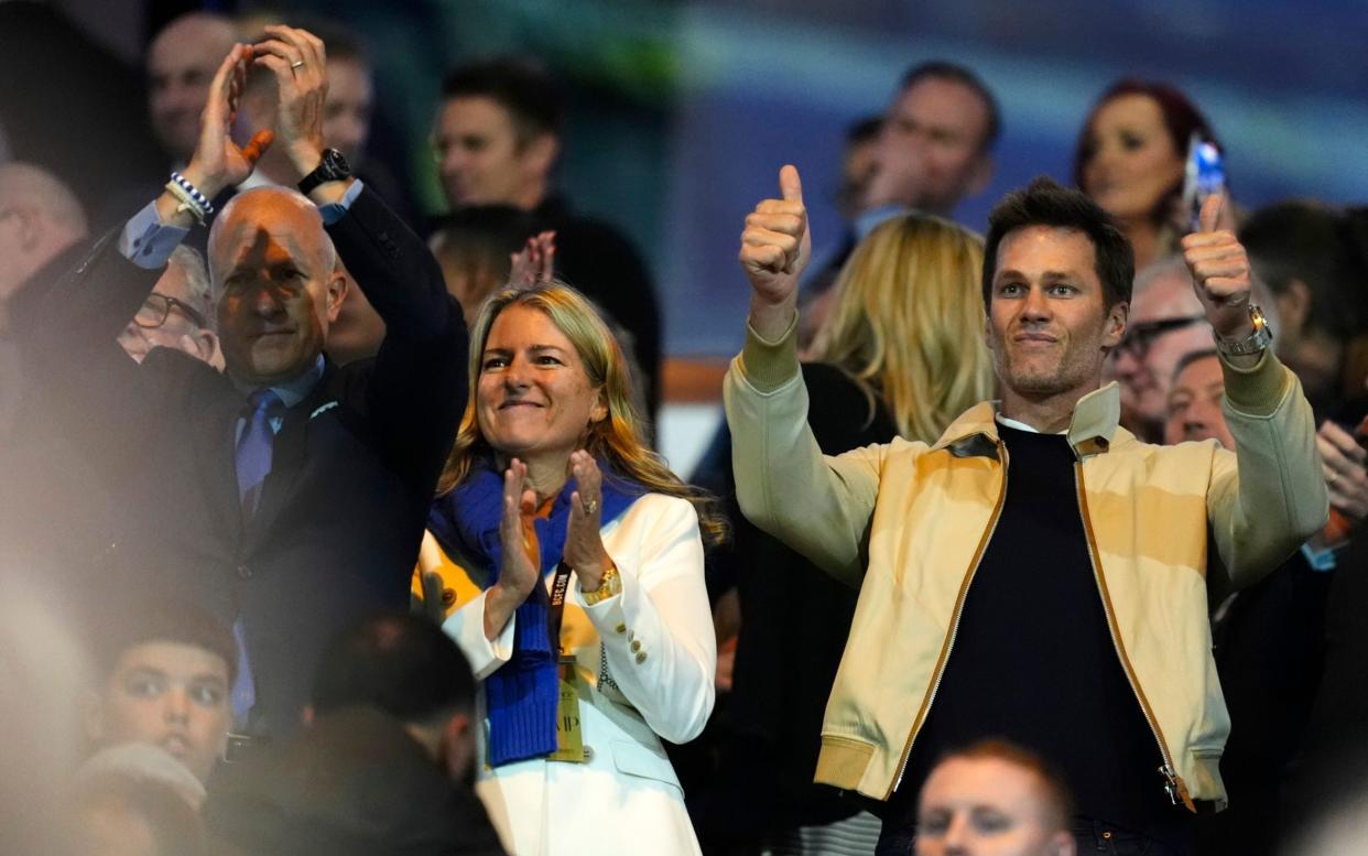 Birmingham City chairman Tom Wagner celebrates with Cindy Wagner, wife, and Tom Brady, former NFL player and Birmingham investor