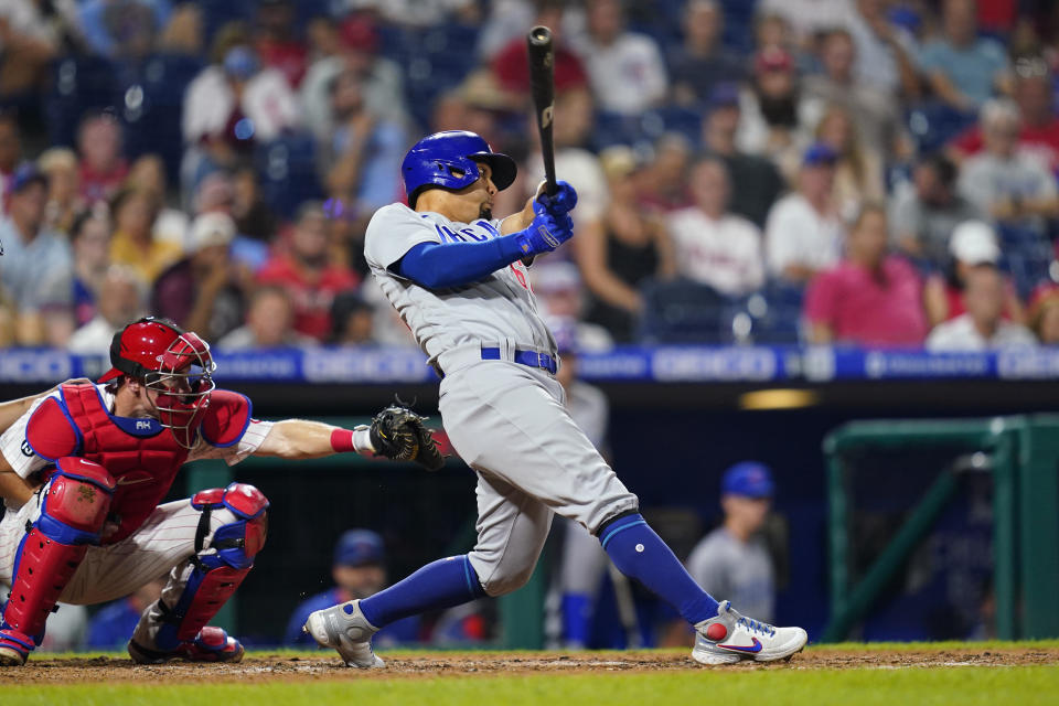 Chicago Cubs' Rafael Ortega hits an RBI-double off Philadelphia Phillies pitcher Kyle Gibson during the fifth inning of a baseball game, Tuesday, Sept. 14, 2021, in Philadelphia. (AP Photo/Matt Slocum)