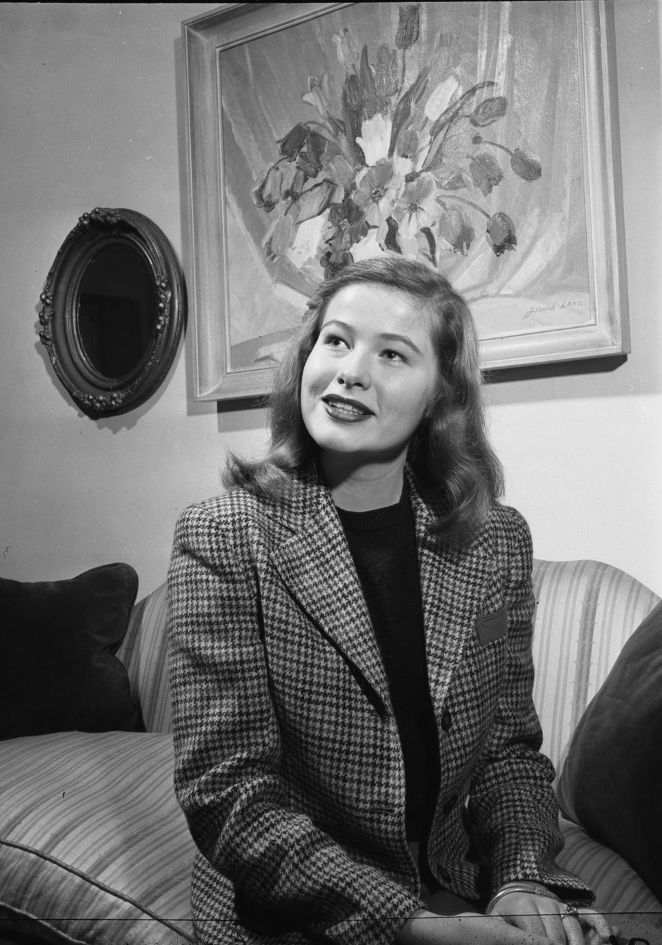 Nancy Olson, 19, is shown at her parents' home on Milwaukee's west side over the Christmas holiday after signing a movie contract with Paramount. Olson, at the time a student at the University of California, Los Angeles, was expecting to make a screen test when she returned to L.A. This photo was published in the Dec. 30, 1947, Milwaukee Journal.