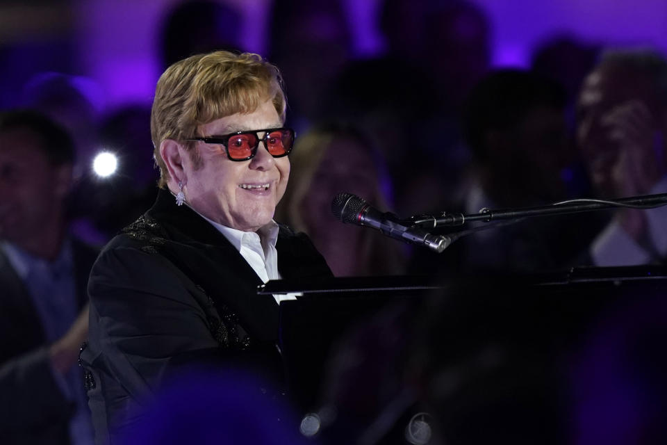 Elton John performs on the South Lawn of the White House in Washington, Friday, Sept. 23, 2022. John is calling the show "A Night When Hope and History Rhyme," a reference to a poem by Irishman Seamus Heaney that President Joe Biden often quotes. (AP Photo/Susan Walsh)