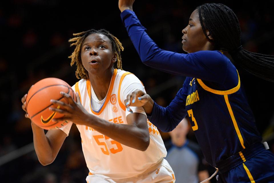 Tennessee forward Jillian Hollingshead (53) looks to shoot past Chattanooga forward/center Takia Davis (3) during a game between Tennessee and Chattanooga at Thompson-Boling Arena in Knoxville, Tenn., on Tuesday, Dec. 6, 2022.
