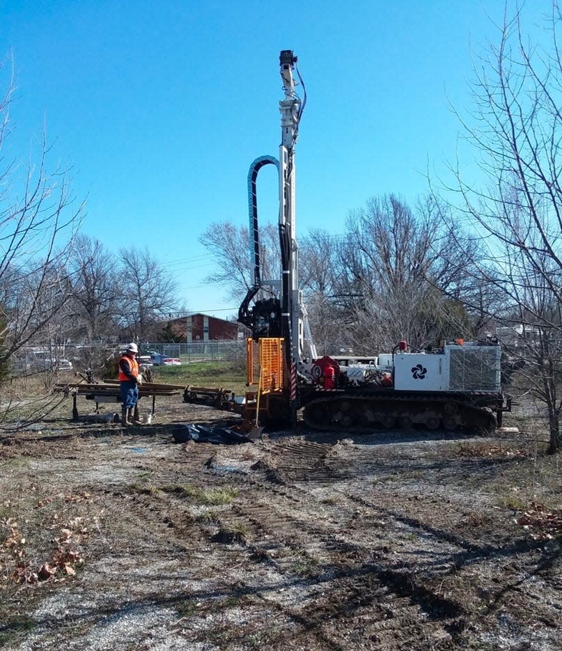 A photo shows water testing being done at the site of the old Kerr-McGee facility in northwest Springfield.