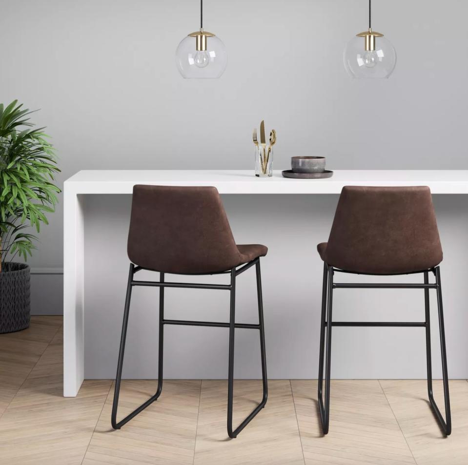 The faux leather bar stool in brown