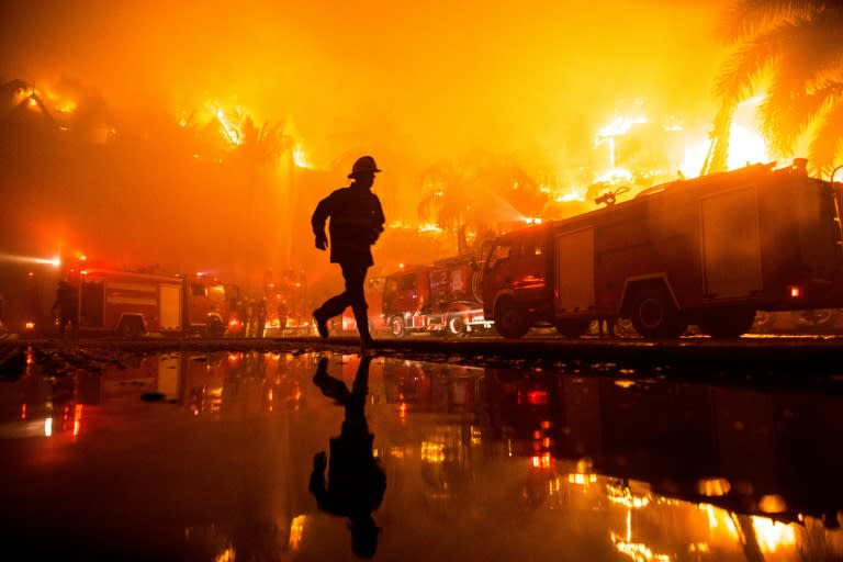 At least one person is believed to have died in the blaze which hit one of Yangon's best known hotels