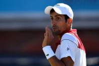 Tennis - ATP 500 - Fever-Tree Championships - The Queen's Club, London, Britain - June 22, 2018 Serbia's Novak Djokovic reacts during his quarter final match against France's Adrian Mannarino Action Images via Reuters/Tony O'Brien