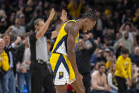 Indiana Pacers guard Bennedict Mathurin (00) reacts after scoring a three-point basket during the second half of an NBA basketball game against the Brooklyn Nets in Indianapolis, Friday, Nov. 25, 2022. (AP Photo/Doug McSchooler)