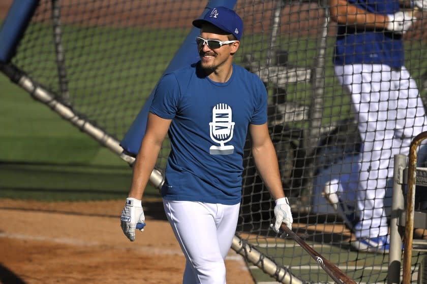 Los Angeles Dodgers' Enrique Hernandez smiles during batting practice.