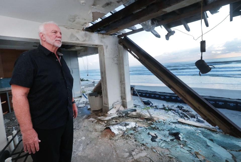 For about three years, Phil Martin had a simple oceanfront house on a beautiful, nearly untouched stretch of the beach in Wilbur-By-The-Sea. Then last September's Tropical Storm Ian roared into eastern Volusia County and tore apart Martin's tranquil escape on the edge of the Atlantic Ocean. He plans to rebuild on the same property.