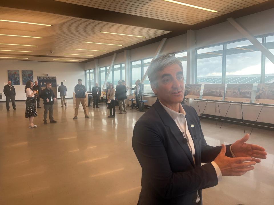 Mayor Miro Weinberger talks to reporters about the Cherry Street shelter following a press conference at Patrick Leahy Burlington International Airport on March 20, 2024.