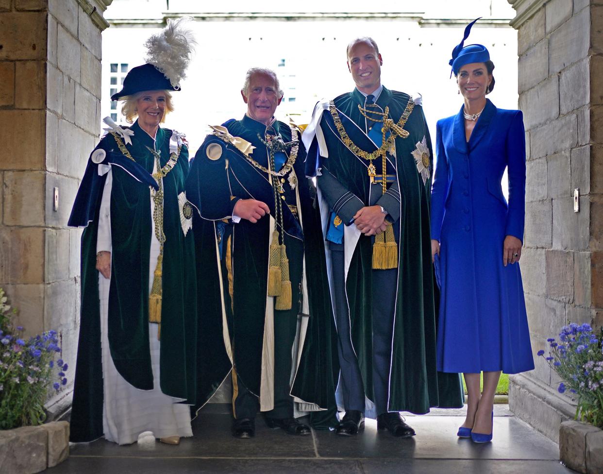 Queen Camilla, King Charles III, Prince William, Prince of Wales and Catherine, Princess of Wales pose for a photograph after watching a fly-past (POOL/AFP via Getty Images)