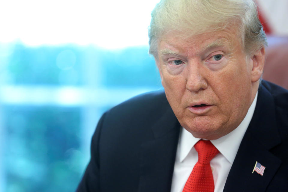 U.S. President Donald Trump speaks as he receives a status report on Hurricane Dorian in the Oval Office of the White House in Washington, U.S., September 4, 2019. REUTERS/Jonathan Ernst