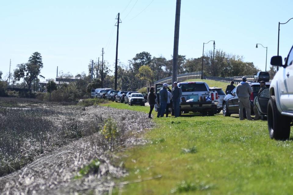 Family members of Mallory Beach waited near Archers Creek as crews continued to search for the teen on Monday afternoon, who went missing following an early morning boat crash on Sunday.