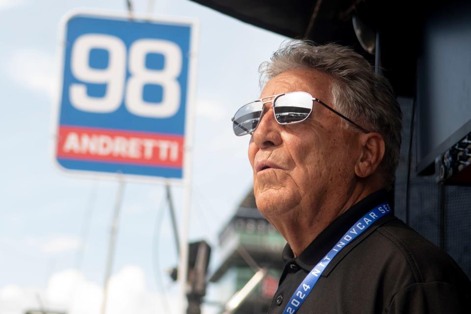 Mario Andretti looks out on the track Friday, May 17, 2024, during Fast Friday ahead of the 108th running of the Indianapolis 500 at Indianapolis Motor Speedway.