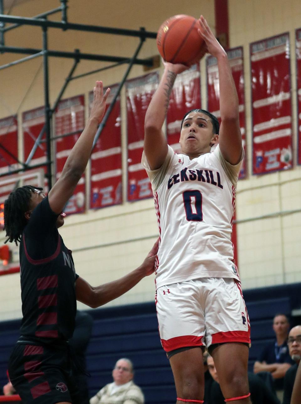 Peekskill's Jaden Chavis (0) puts up a shot against Nyack during basketball action at Peekskill High School Jan. 24, 2024.