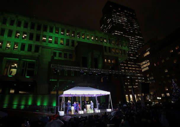 PHOTO: Britain's Prince William and Catherine, Princess of Wales and Mayor of Boston Michelle Wu turn the lights on on Boston City Hall, in Boston, Nov. 30, 2022. (Brian Snyder/Reuters)