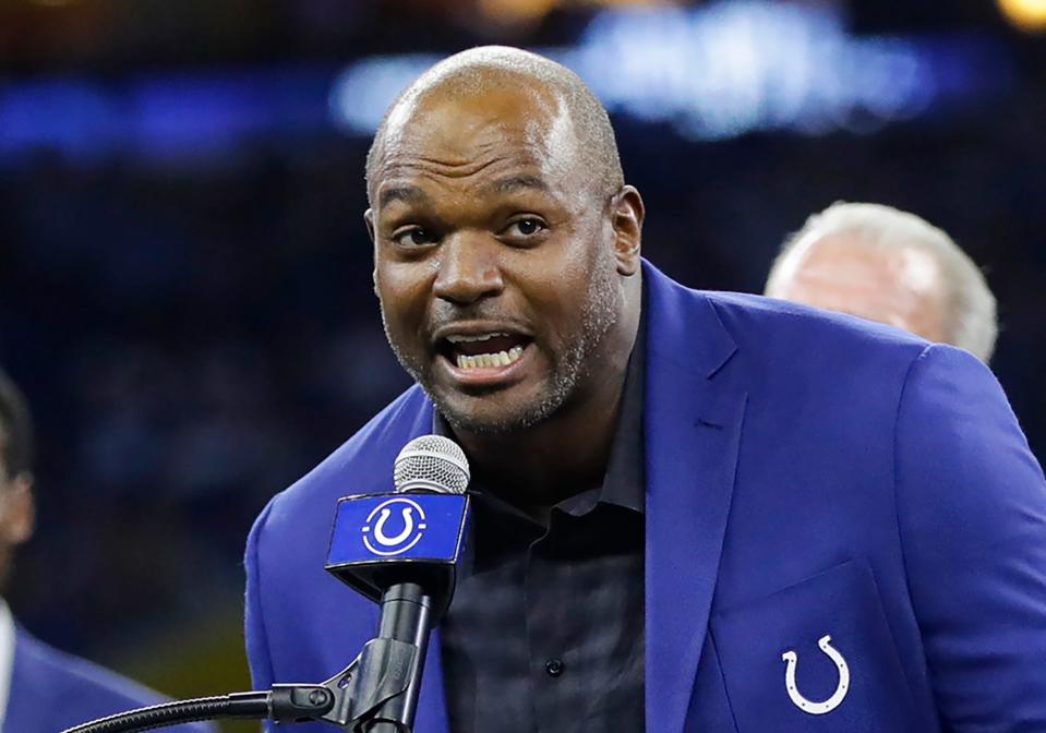 FILE - Former Indianapolis Colts defensive end Dwight Freeney speaks during his Ring of Honor induction ceremony during half time of an NFL football game against the Miami Dolphins in Indianapolis on Nov. 10, 2019. Joe Thomas, Darrelle Revis and Freeney are finalists in their first year of eligibility for the Pro Football Hall of Fame’s class of 2023. (AP Photo/Darron Cummings, File)