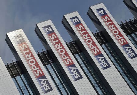 Sky Sports logos are seen on the side of offices at their UK company headquarters in west London July 25, 2014. Britain's BSkyB has agreed to pay 4.9 billion pounds ($8.3 billion) in cash to buy Rupert Murdoch's pay-TV assets in Germany and Italy, responding to slowing growth at home by creating a European media powerhouse. REUTERS/Toby Melville