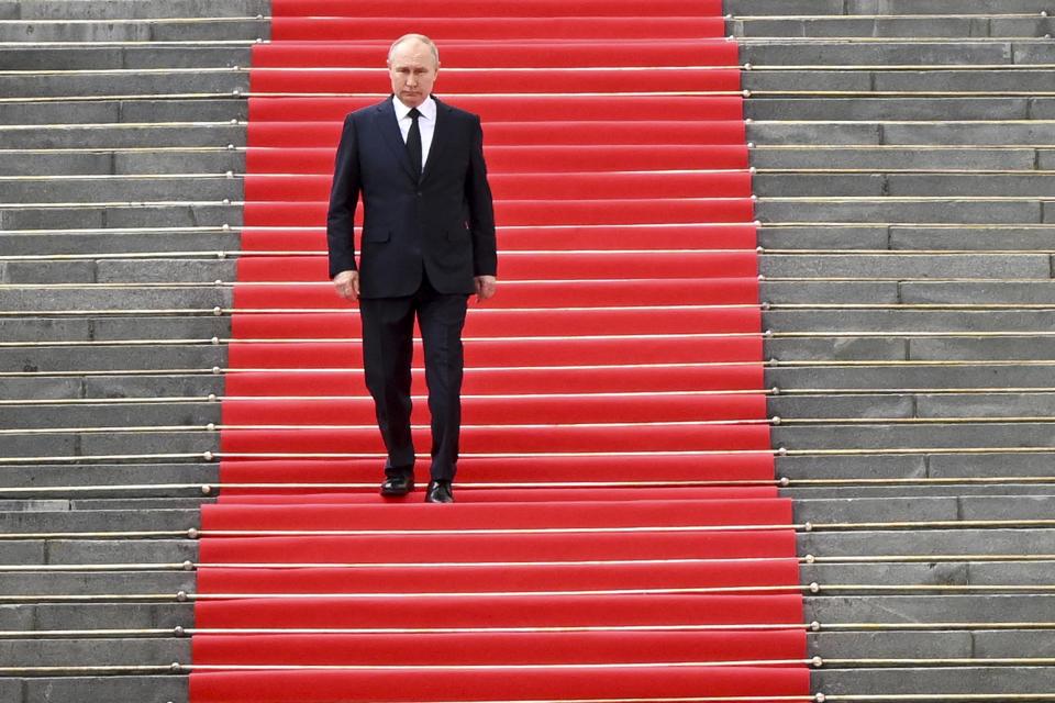 Russian President Vladimir Putin arrives to deliver a speech to the units of the Russian Defense Ministry, the Russian National Guard (Rosgvardiya), the Russian Interior Ministry, the Russian Federal Security Service and the Russian Federal Guard Service, who ensured order and legality during the mutiny, at the Kremlin in Moscow, Russia, Tuesday, June 27, 2023. (Sergei Guneyev, Sputnik, Kremlin Pool Photo via AP)