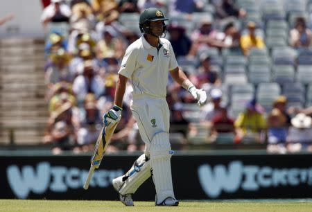 Australia's Joe Burns walks off the ground after being dismissed for 40 runs during the first day of the second cricket test match against New Zealand at the WACA ground in Perth, Western Australia, November 13, 2015. REUTERS/David Gray