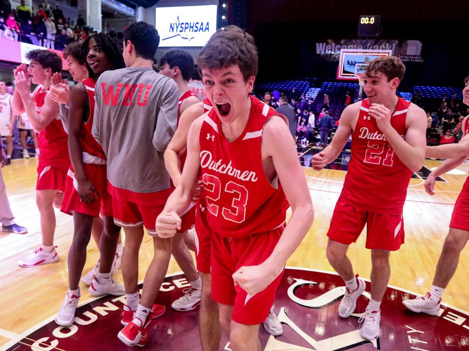 Pat Lineman and the rest of Tappan Zee celebrate after defeating Somers 39-15 to win the Section 1 Class A Boys Basketball championship at the Westchester County Center March 5, 2023. 