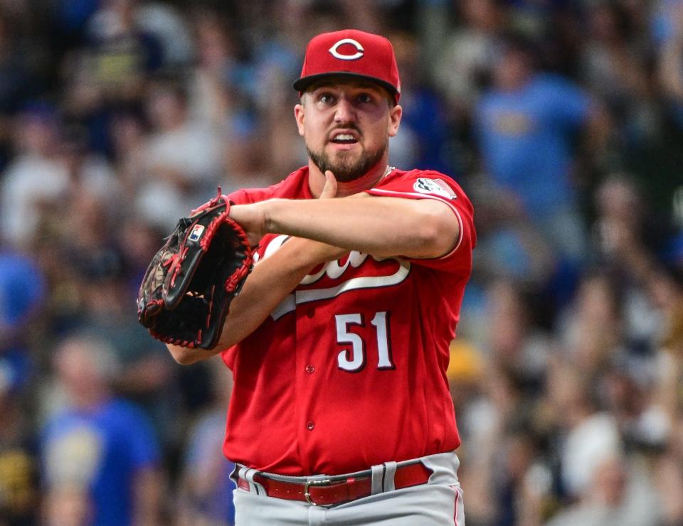 Aug 7, 2022; Milwaukee, Wisconsin, USA; Cincinnati Reds pitcher Graham Ashcraft (51) reacts after giving up a home run to Milwaukee Brewers shortstop Willy Adames (not pictured) in the third inning at American Family Field. Mandatory Credit: Benny Sieu-USA TODAY Sports