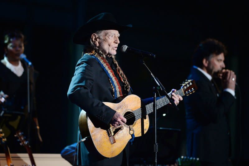 Willie Nelson performs at "A Salute to the Troops: In Performance at the White House" concert on the South Lawn in 2014 in Washington. File Photo by Olivier Douliery/Pool