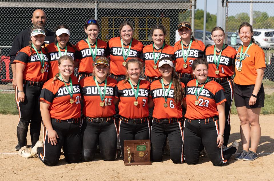The Marlington softball team poses for a photo after beating Aurora to win the Division II district final, Thursday, May 18, 2023, in Jefferson.