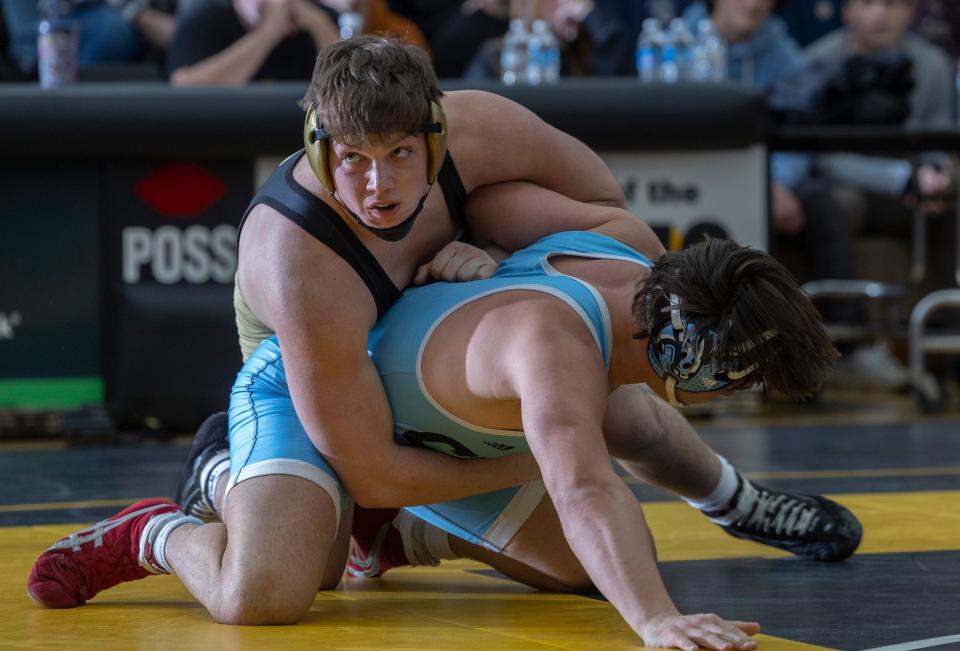 Southern's Riley O'Boyle (left), shown wrestling Christian Brothers Academy's Peter Grippo Tuesday night, pinned Central's Riley O'Boyle in a matchup of returning state 215-pound qualifiers Wednesday night.