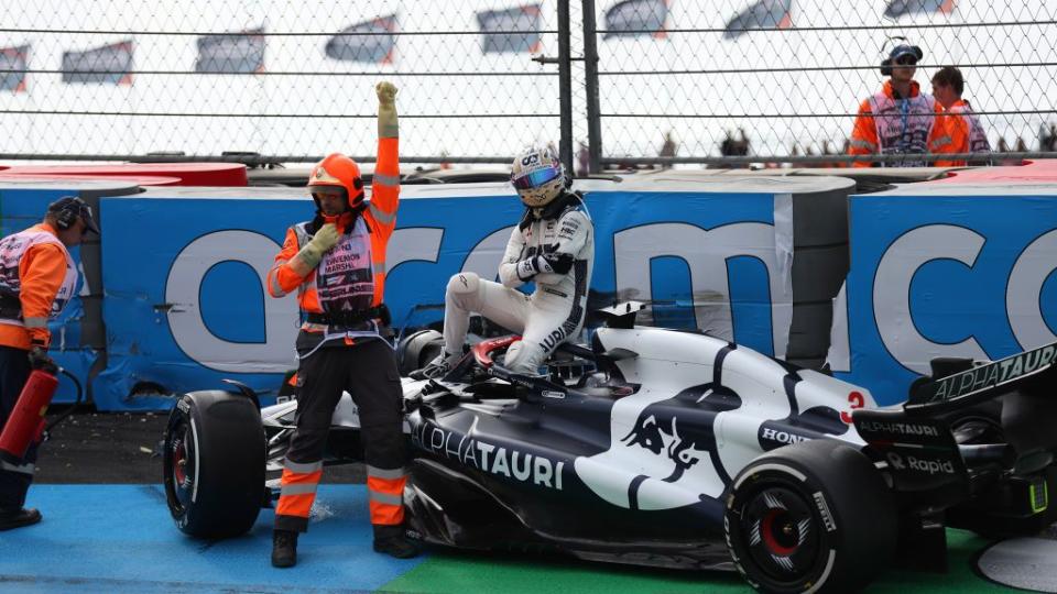 zandvoort, netherlands august 25 daniel ricciardo of australia and scuderia alphatauri walks from his car after crashing during practice ahead of the f1 grand prix of the netherlands at circuit zandvoort on august 25, 2023 in zandvoort, netherlands photo by lars barongetty images