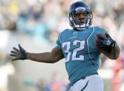 Jacksonville Jaguars Maurice Jones-Drew looks to the sideline as he runs the ball in for a touchdown during the second half of their NFL football game against the Oakland Raiders in Jacksonville, Florida