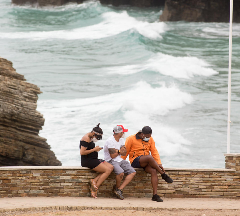 LUGO, SPAIN - JULY 05: Citizens are seen at Las Catedrales beach, in the Galician region of A Mariña at Lugo, which will be closed for five days after a coronavirus outbreak that affects more than a hundred people declared, on July 05, 2020 in Lugo, Spain. (Photo by Carlos Castro/Europa Press via Getty Images)