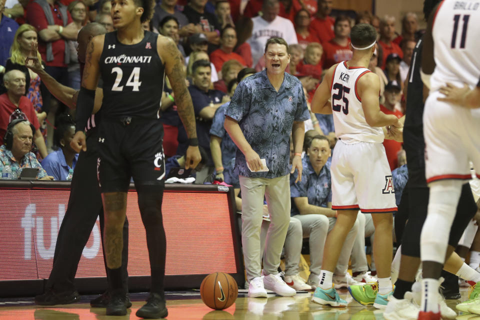 Arizona head coach Tommy Lloyd reacts to play against Cincinnati during the first half of an NCAA college basketball game, Monday, Nov. 21, 2022, in Lahaina, Hawaii. (AP Photo/Marco Garcia)