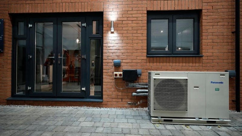 A ground source heat pump sits outside a home built inside the Energy House 2 research facility at Salford University on January 24, 2023 in Salford, England. 