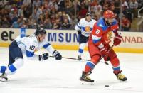 Sep 22, 2016; Toronto, Ontario, Canada; Team Russia forward Alex Ovechkin (8) stick handles the puck past Team Finland defenceman Sami Lepisto (18) during preliminary round play in the 2016 World Cup of Hockey at Air Canada Centre. Mandatory Credit: Dan Hamilton-USA TODAY Sports