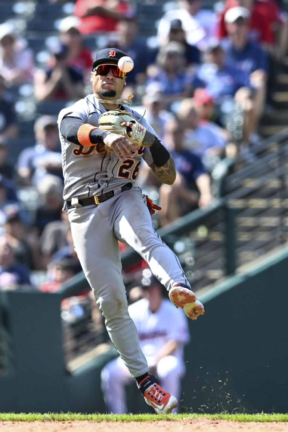 Detroit Tigers' Javier Báez throws out Cleveland Guardians' Tyler Freeman at second base during the seventh inning of a baseball game, Sunday, Aug. 20, 2023, in Cleveland. (AP Photo/Nick Cammett)